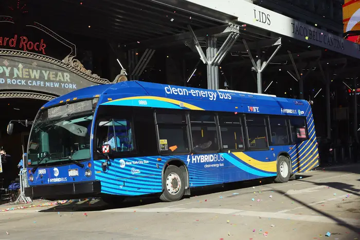 An MTA bus rolls on a New York City street